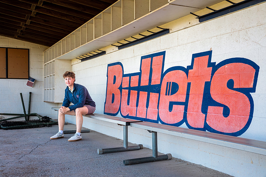 Tyler Hillson &rsquo;26 sitting on a bench