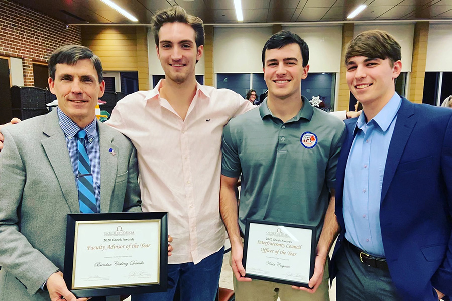 Prof. Brendan Cushing-Daniels alongside Nate Carlson &rsquo;20, Kevin Cosgrave &rsquo;20, and Peter McQuade