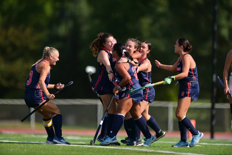 Members of the field hockey team celebrating